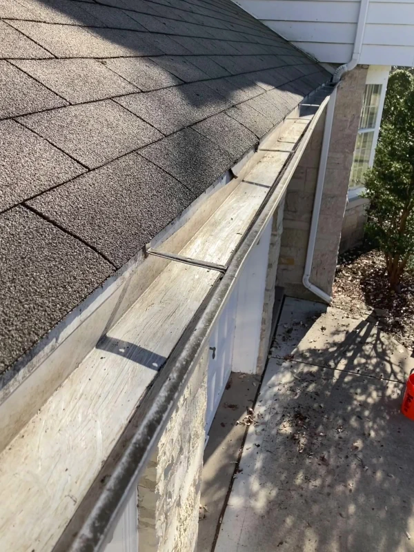 clean and debris free 1st story rain gutters after professional gutter cleaning service