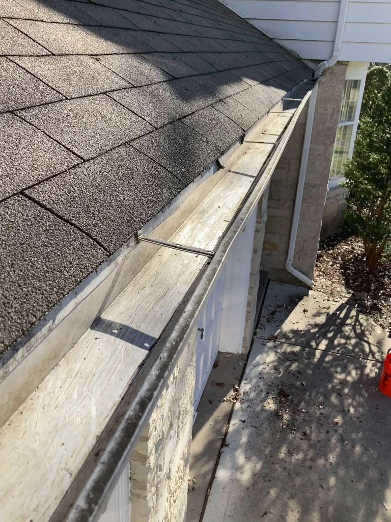 clean and debris free 1st story rain gutters after professional gutter cleaning service